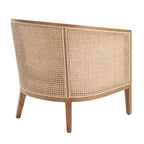 Poltrona di design in lino naturale con schienale curvo e struttura in rattan, seduta singola